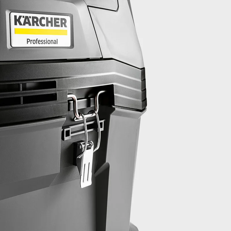 Grauer Kärcher Professional Staubsauger mit Metallverschluss, Nahaufnahme des oberen Teils.