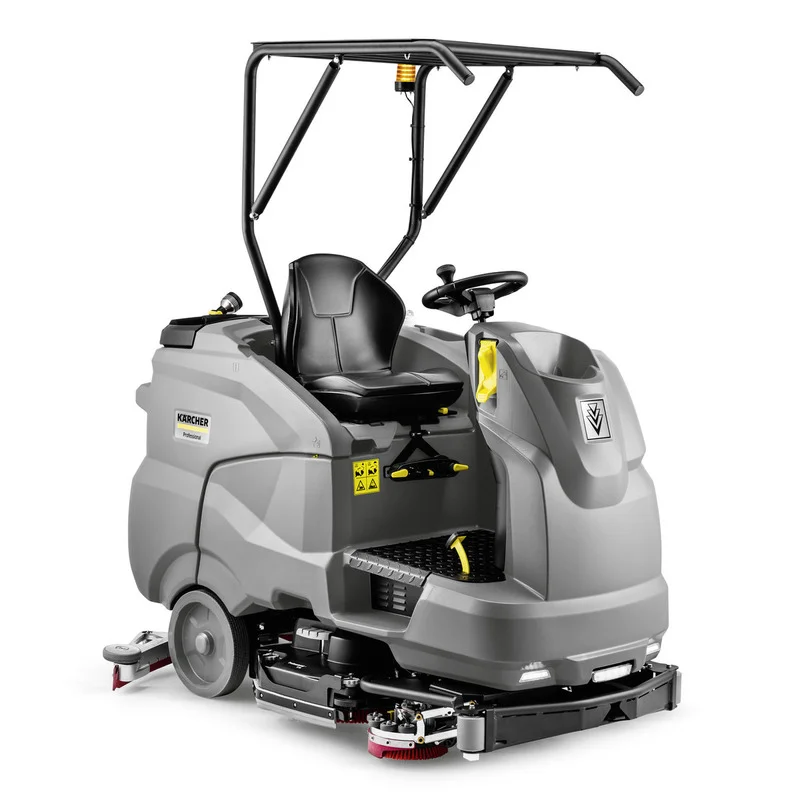Graue Kärcher Aufsitz-Scheuersaugmaschine mit schwarzem Sitz und Lenkrad, geeignet für professionelle Reinigung.